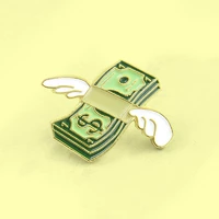 Значок пачка банкнот з крилами RESTEQ. Пін долари з крильцями. Металевий значок долар